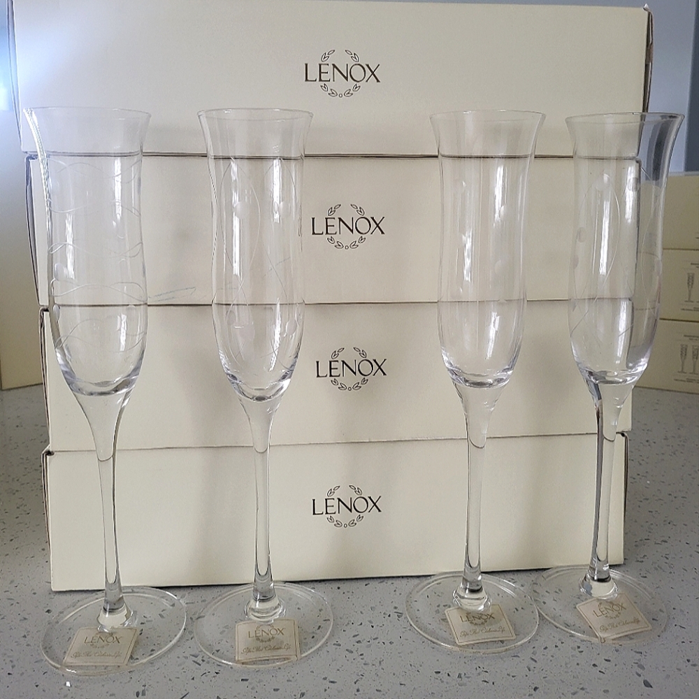 8 Lenox Champagne Flutes. 2 sets of 4.